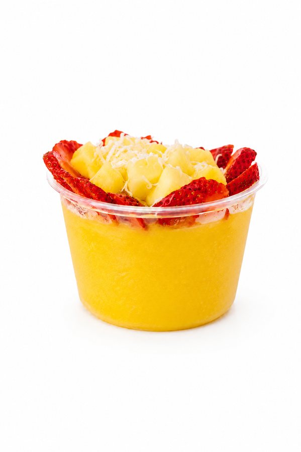 Mango sorbet bowl with strawberries and coconut