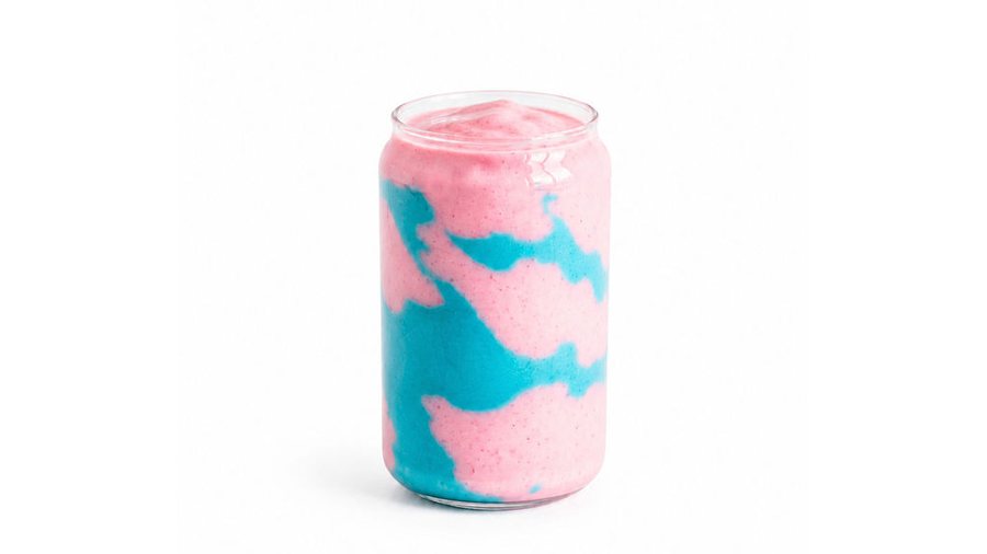Pink and blue swirled strawberry colada shake